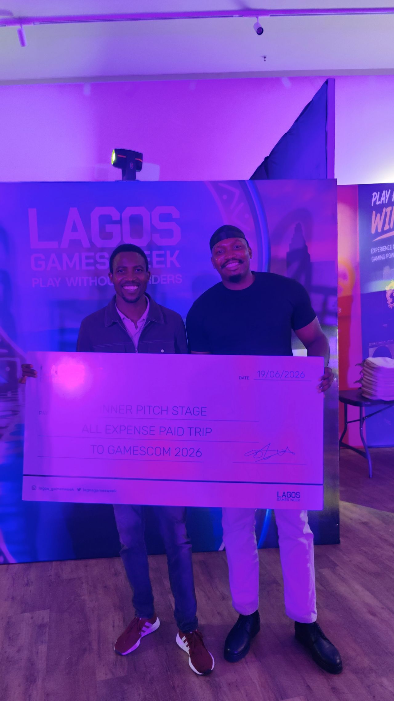 CodeBox Games team members holding the Pitch Stage winner prize